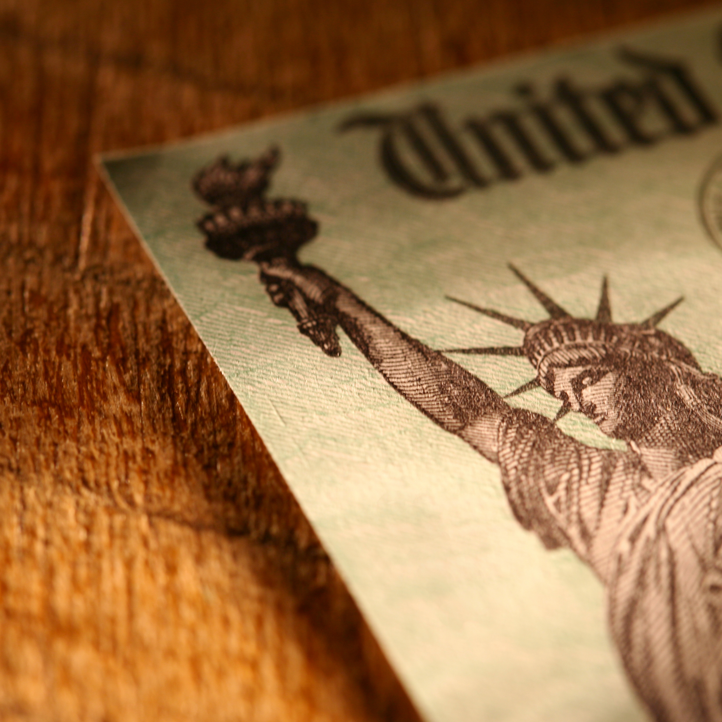 Treasury Check image on wooden background